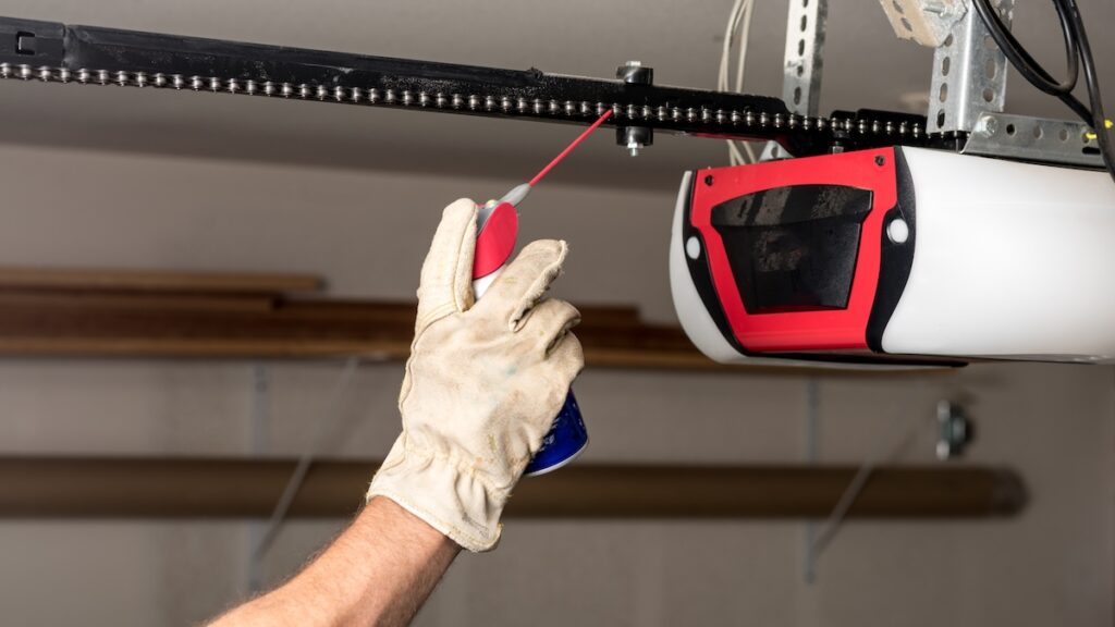 Preventive maintenance on a garage door opener chain with some oil